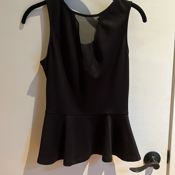 NWOT Guess Black Peplum Top with mesh panel. Size small - Picture 3 of 4